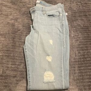 Gently used Rock & Republic lite blue denim jeans. Size 14M skinny ripped